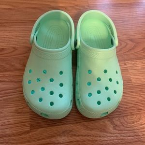 Mint green crocs